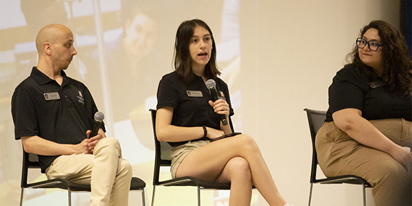 Students on a panel